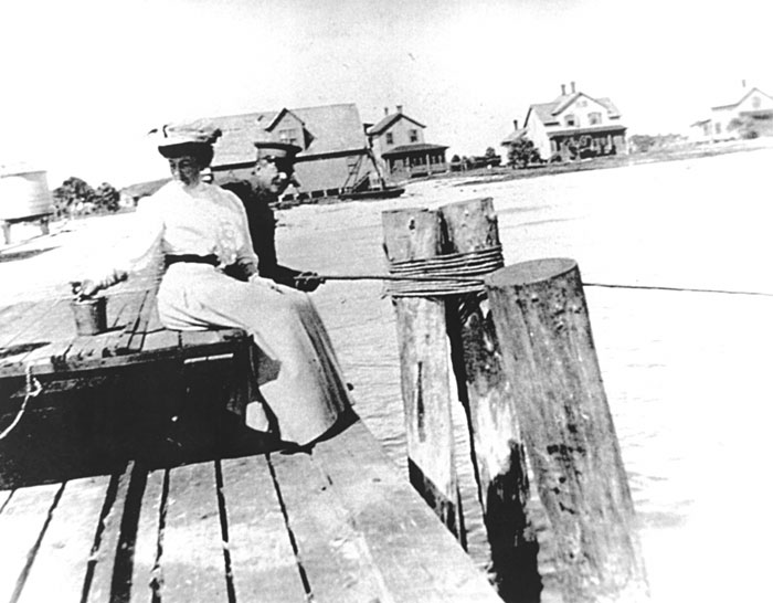 People Fishing on Wharf